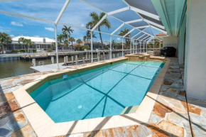 ELEVATED 342 - Sunny Waterfront Pool and Spa 3 Bed home